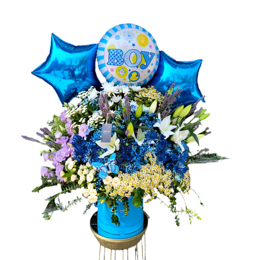 Luxury Baby Boy Flower Arrangement with Blue Star Balloons