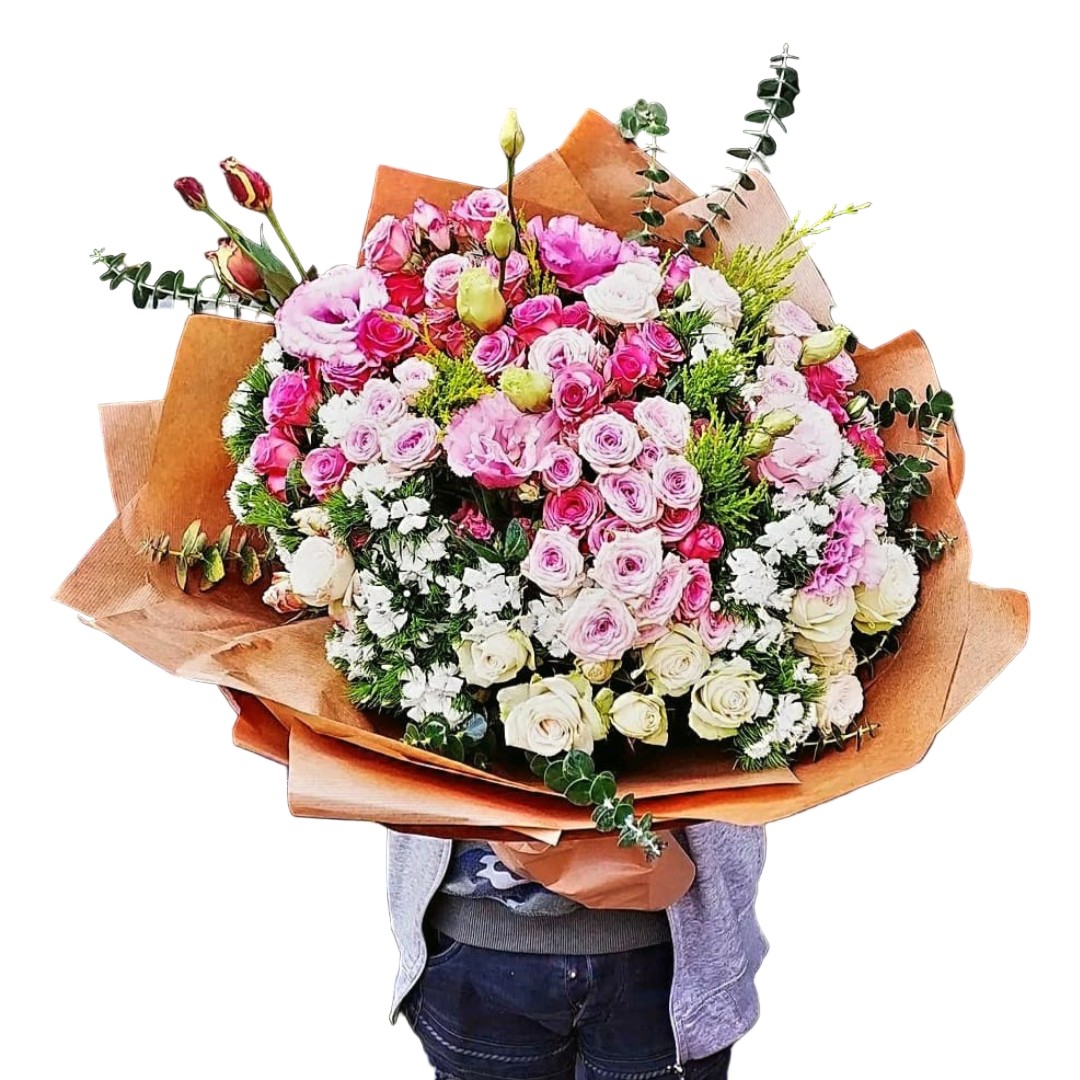 This stunning mix flower bouquet is a perfect combination of pick and white roses, pink estoma flower, and other gorgeous blooms, all expertly arranged with beautiful greenery and elegant accessories. It's an ideal gift for any occasion, from birthdays to anniversaries or simply to brighten someone's day. Order now and let us deliver this breathtaking arrangement straight to your loved one's door.