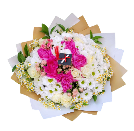 A graduation floral arrangement featuring a mix of pink peonies, white daisies, and pink roses, wrapped in brown paper, with a mini graduation cap and diploma included.
