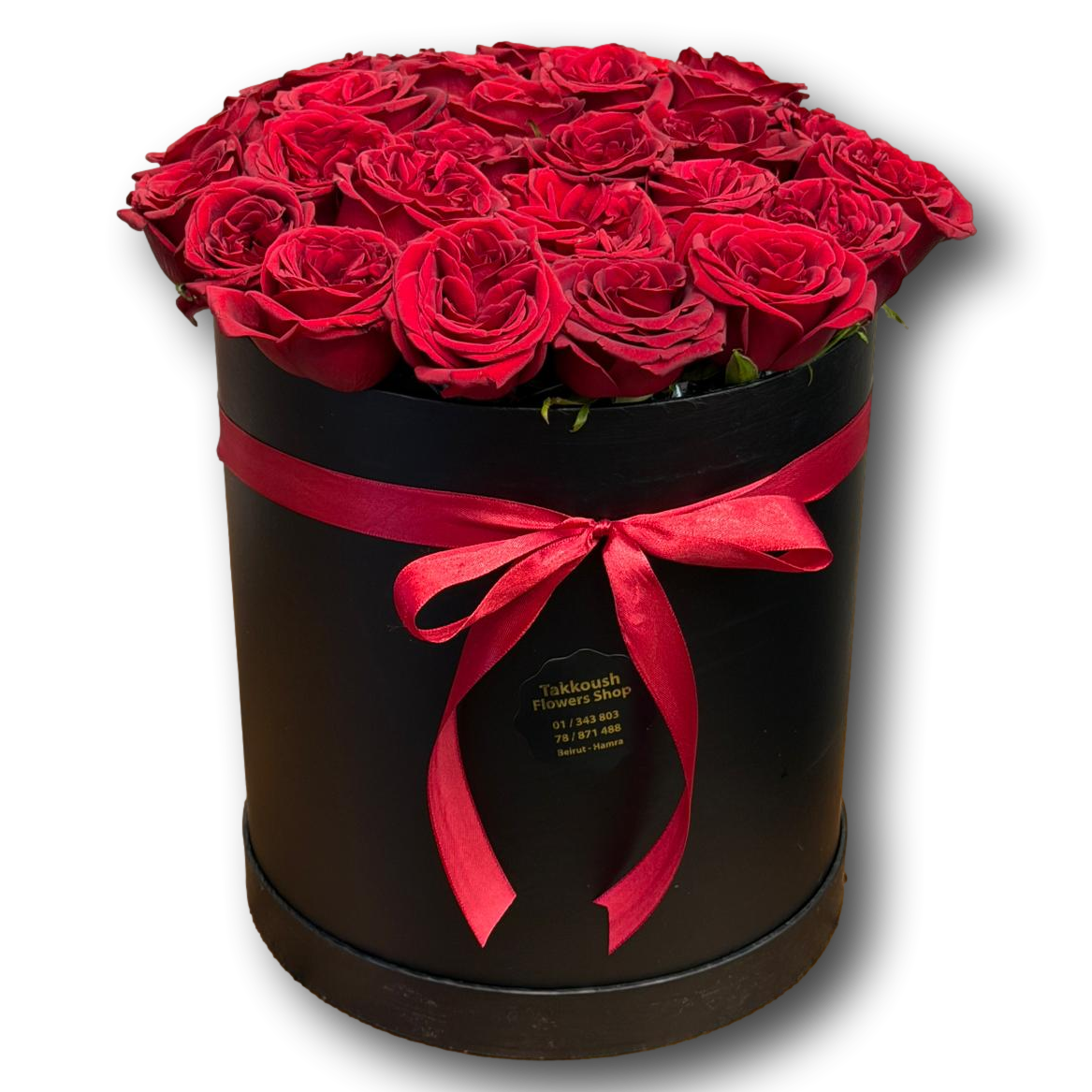 Elegant black flower box filled with 24 red roses and finished with a red ribbon, ideal for Valentine’s Day and timeless romantic gifting