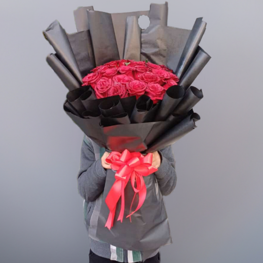 40 red roses wrapped n black