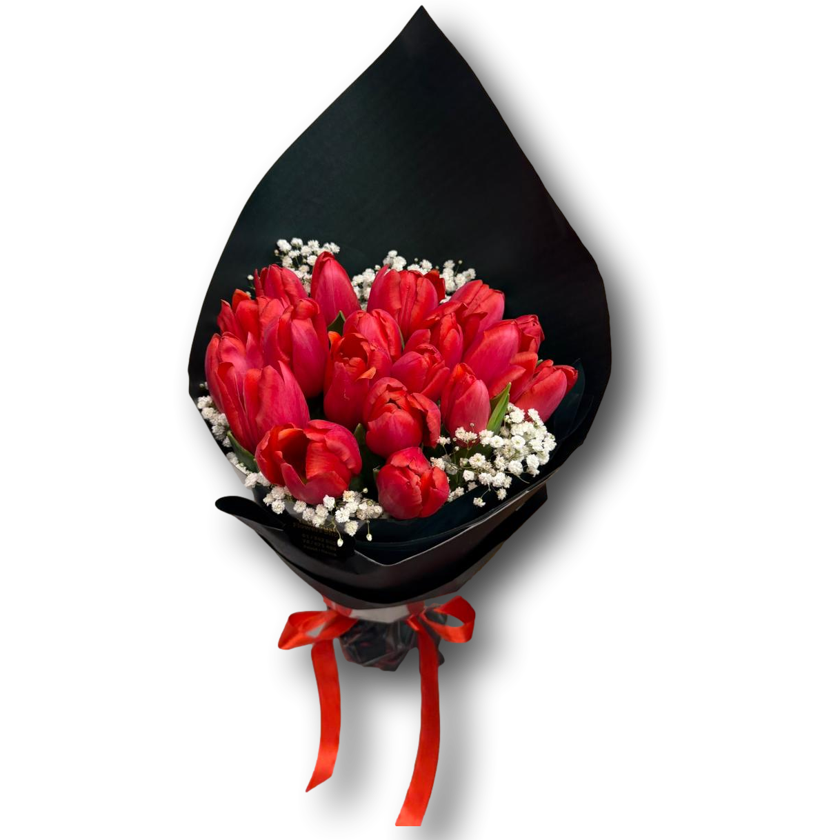 Elegant bouquet of 20 red tulips with delicate white baby’s breath, wrapped in black paper with a red ribbon, perfect for Valentine’s Day and romantic occasions