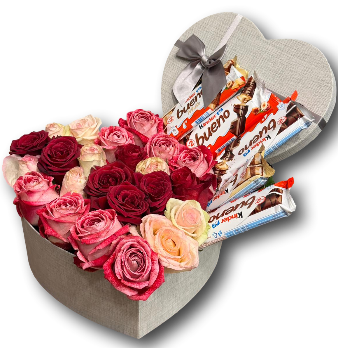 Heart-shaped gift box filled with mixed red, pink, and cream roses paired with Kinder Bueno chocolates, designed for Valentine’s Day and romantic gifting