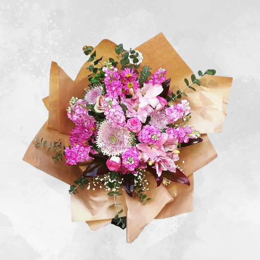 Brighten up any occasion with this stunning mixed flower bouquet featuring lily flowers, chrysanthemums, baby breath, ornamental cabbages, and roses with beautiful accessories and extensions. Perfect for expressing your love, gratitude, or congratulations. Order now and make someone's day!